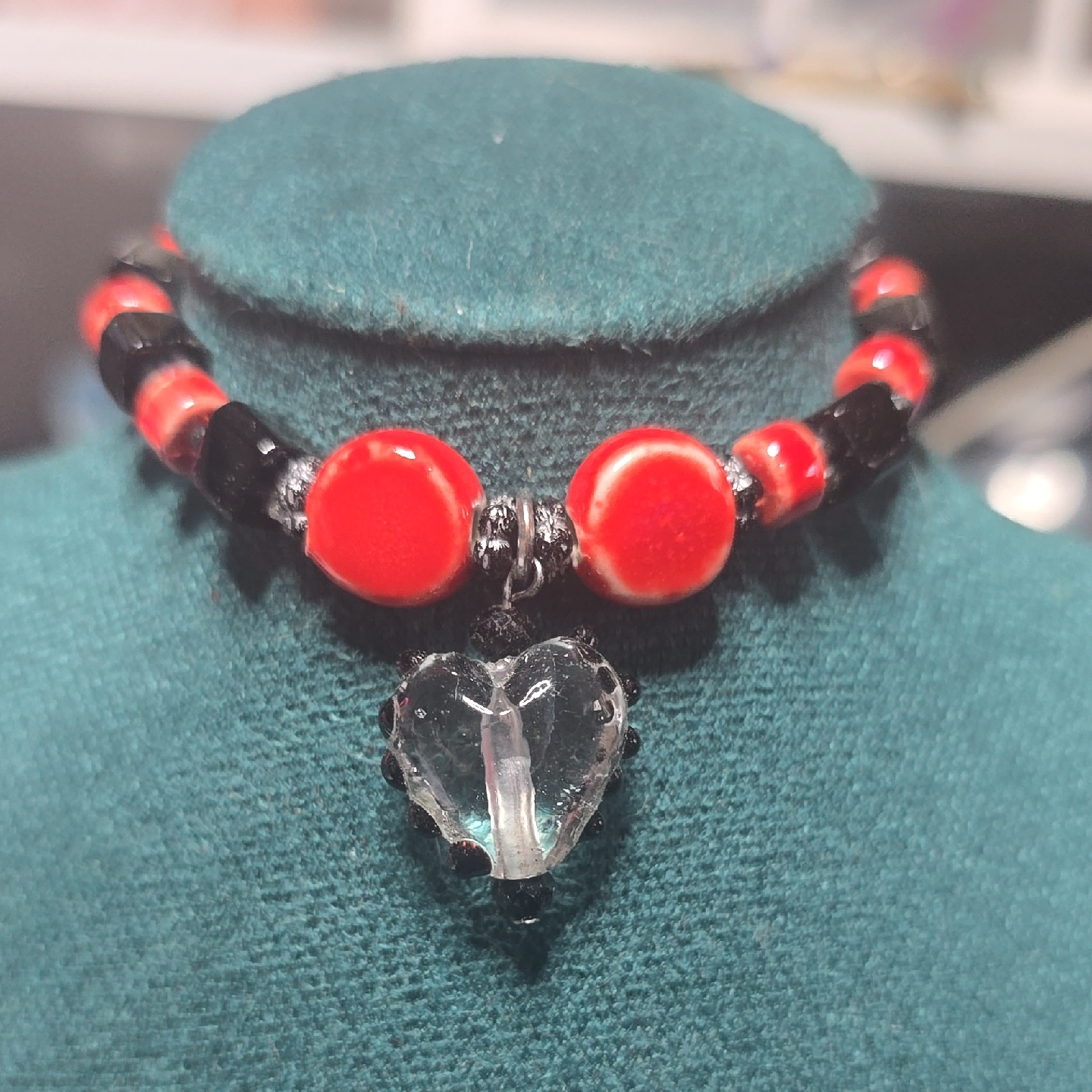 Red And Black Beaded Bracelet With Clear Heart Pendant